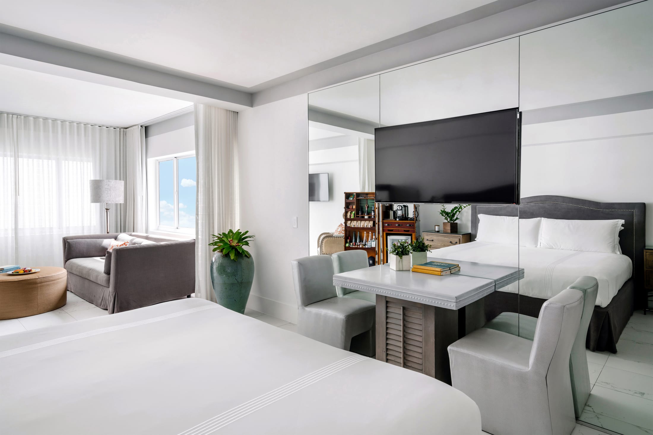 Nautilus by Arlo Accessible King Studio Suite hotel room bed and living area