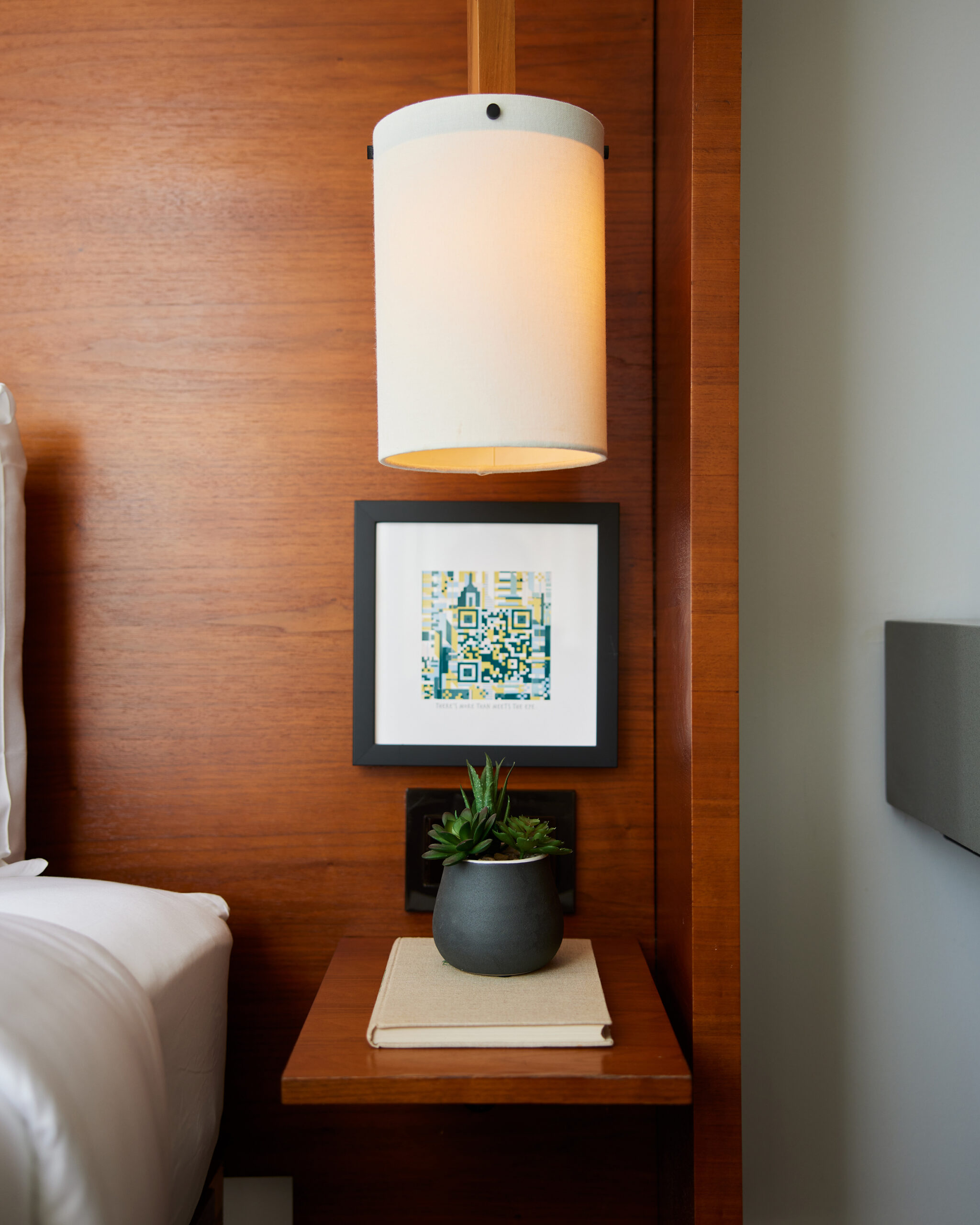 Arlo NoMad Queen Corner hotel room side table and lighting