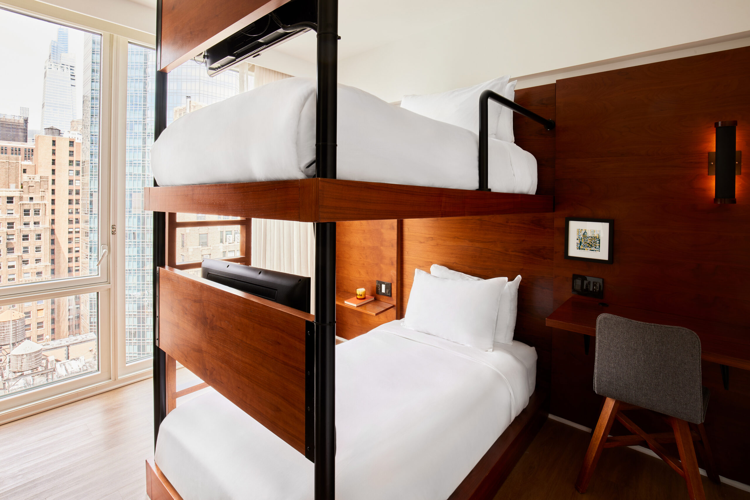 Arlo NoMad Accessible Twin Bunk hotel room beds and writing desk