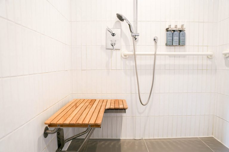 Arlo SoHo Accessible Bunk hotel room shower with bench