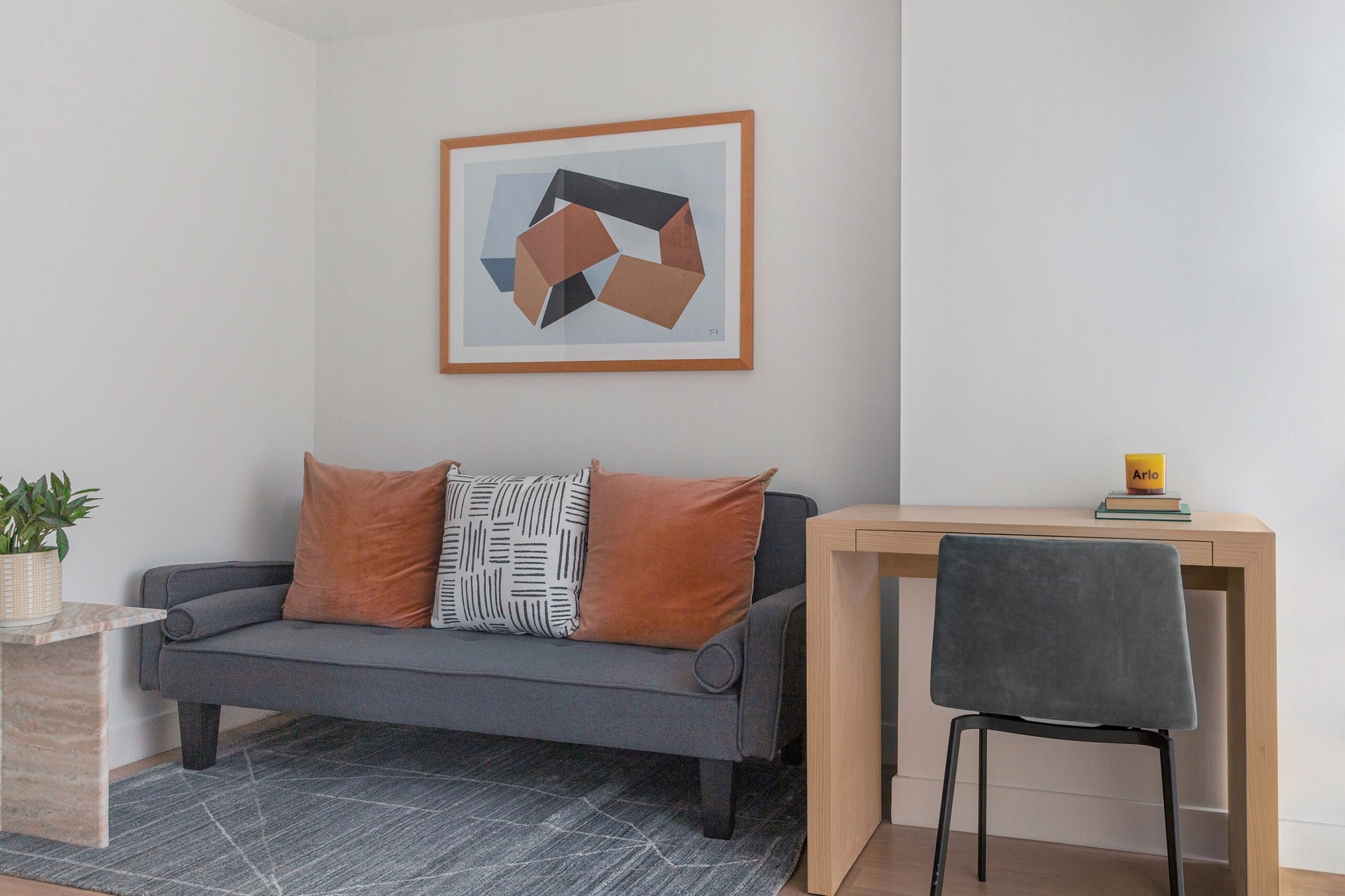 Arlo SoHo Accessible Suite hotel room writing desk and couch