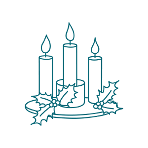 Three lit candles on a tray, decorated with holly leaves and berries.