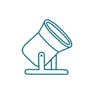 Simple line drawing of a drum-shaped spotlight or floodlight on a stand, angled upward, on a plain background.