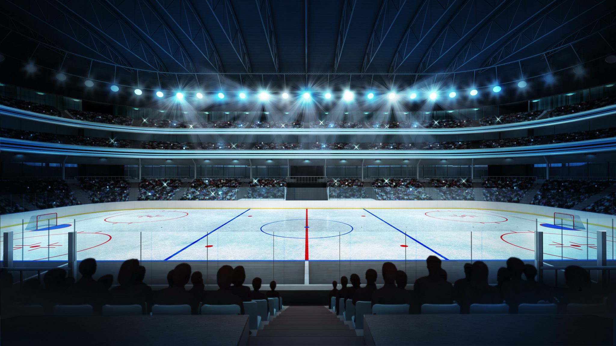 hockey stadium with fans and an empty ice rink