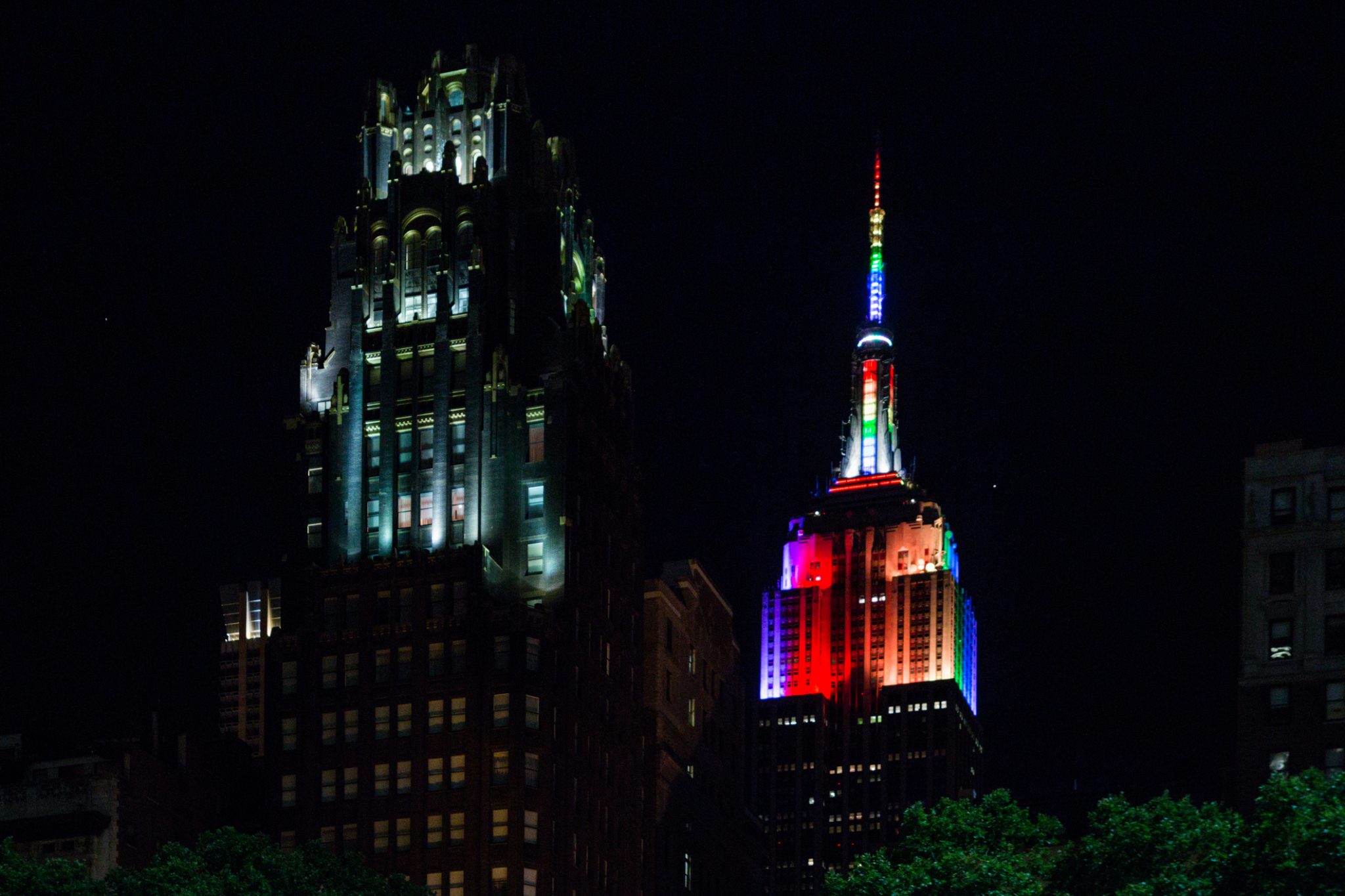 Empire State Building in rainbow flag during annual Pride Parade Night