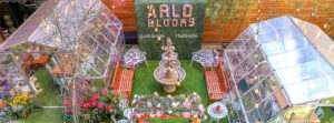 Arlo Blooms with flowers and greenhouses in SoHo Courtyard
