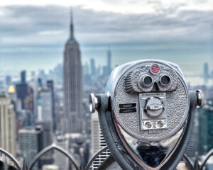 viewfinder looking out into the new york city scape with the empire building in full view