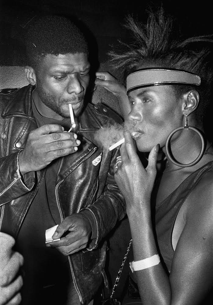 Black and White image of a couple smoking