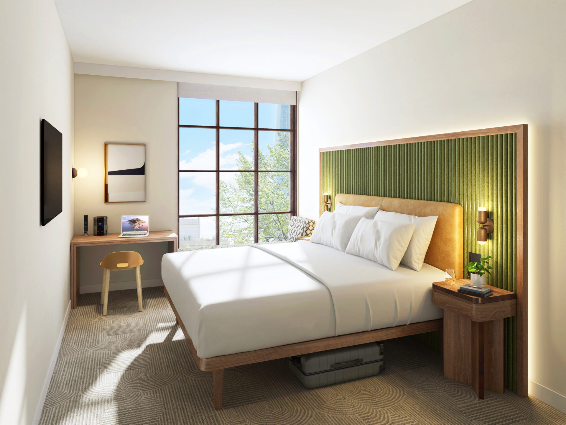 A modern hotel room featuring a large bed with white linens, a green upholstered headboard, a wooden nightstand, a desk with a chair, and a large window showing a view of trees and blue sky.