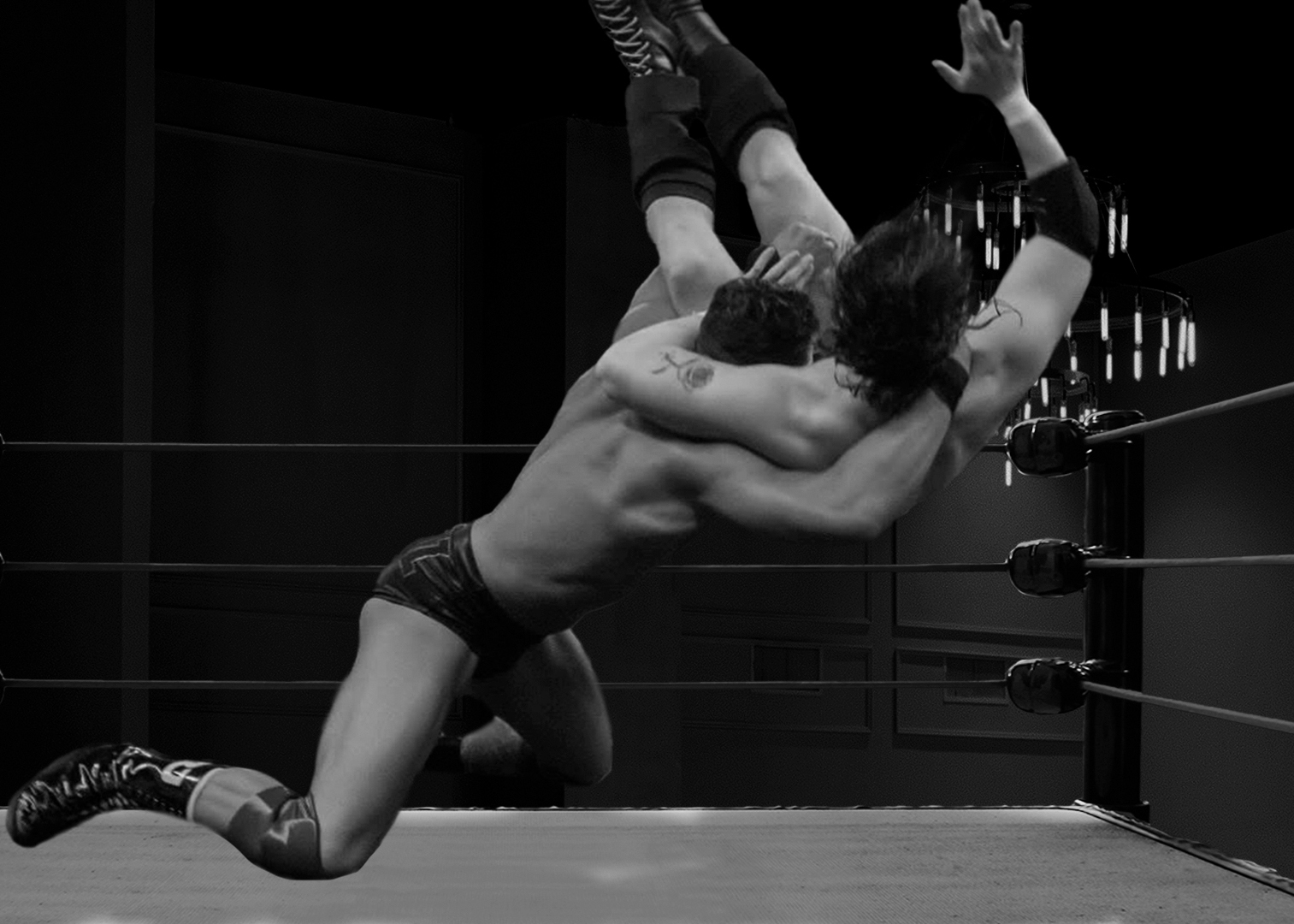 Two wrestlers in a ring, one executing a suplex maneuver on the other.