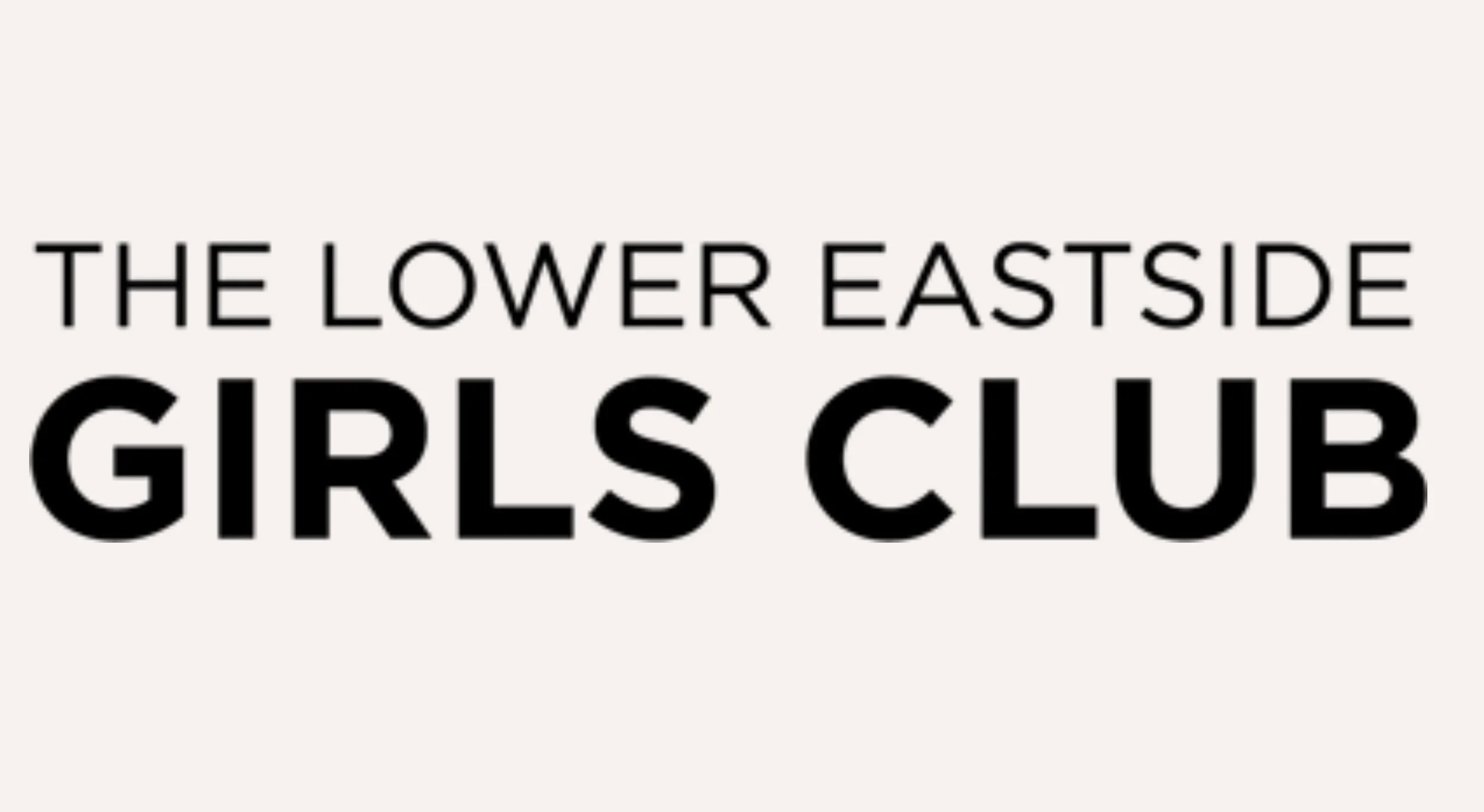 Logo with the text "The Lower Eastside Girls Club" in bold and regular black letters on a plain light background.