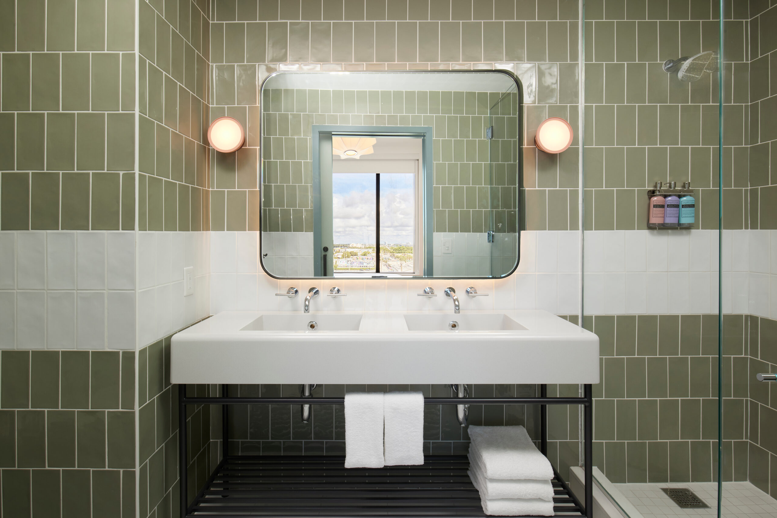 Arlo Wynwood Suite hotel room bathroom sink with vanity mirror